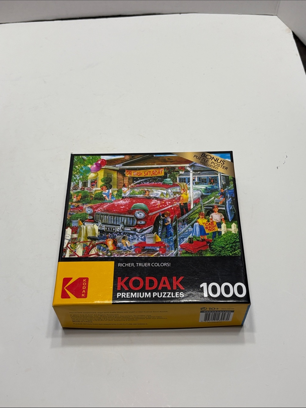 Kodak 1000-Piece Puzzle with Red Car and Multicolor Illustration